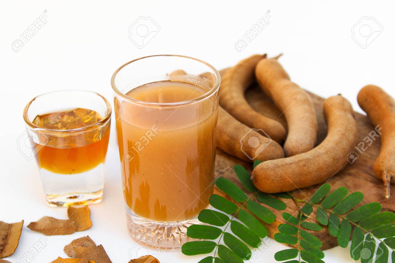 Tamarind And Tamarind Juice With Honey On White Background Stock Photo Picture And Royalty Free Image Image