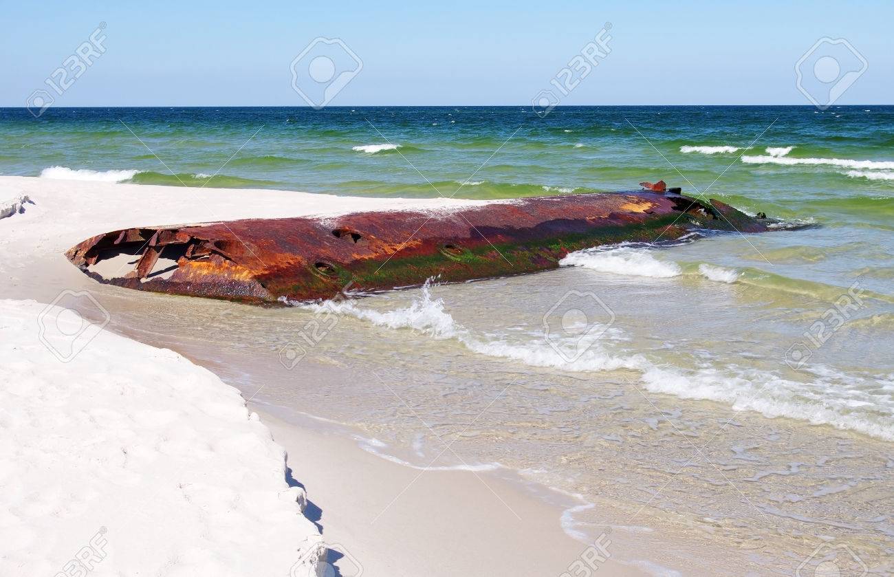 corroded iron tank on the baltic beach hel poland stock photo