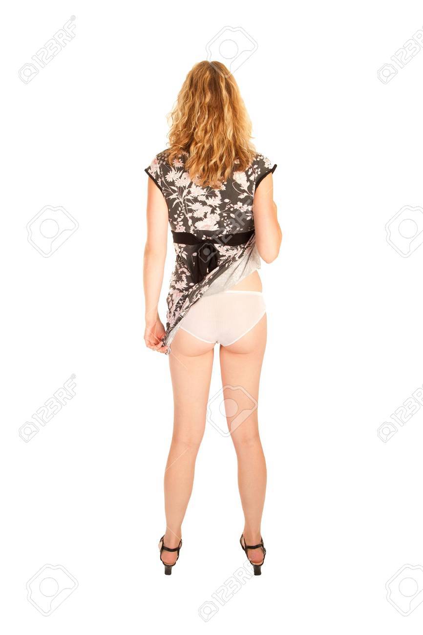 Young Woman Lifting Her Dress, Isolated