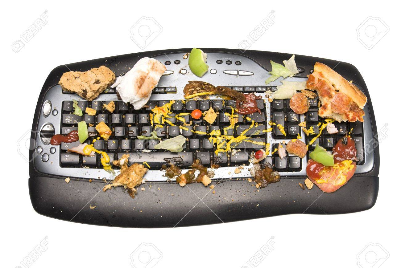 5885579-a-keyboard-covered-with-food-remnants-we-all-know-that-we-are-guilty-of-eating-while-workig-on-our-c.jpg