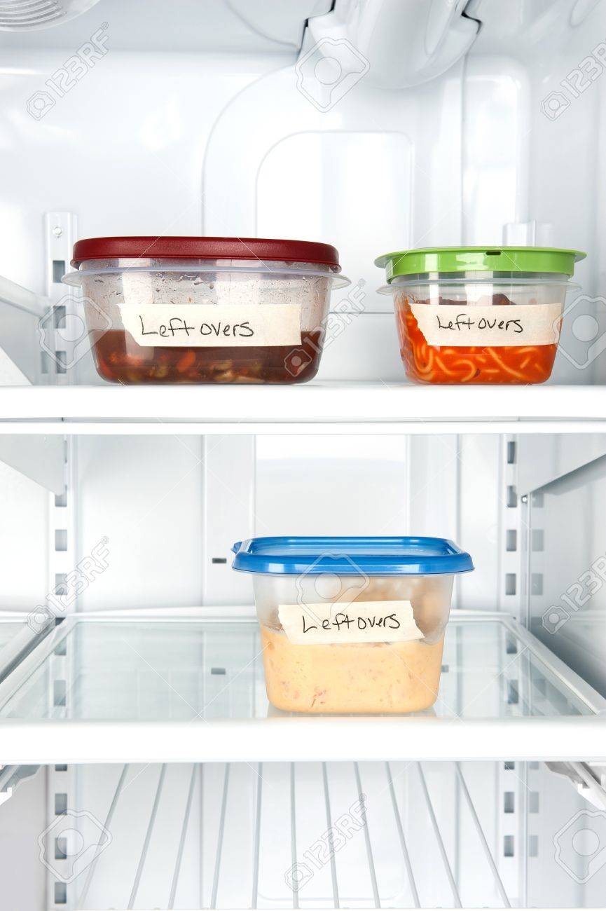 Leftover containers of food in a refrigerator for use with many food inferences. - 8430354 Leftover containers of food in a refrigerator for use with many food inferences. - 8430354
