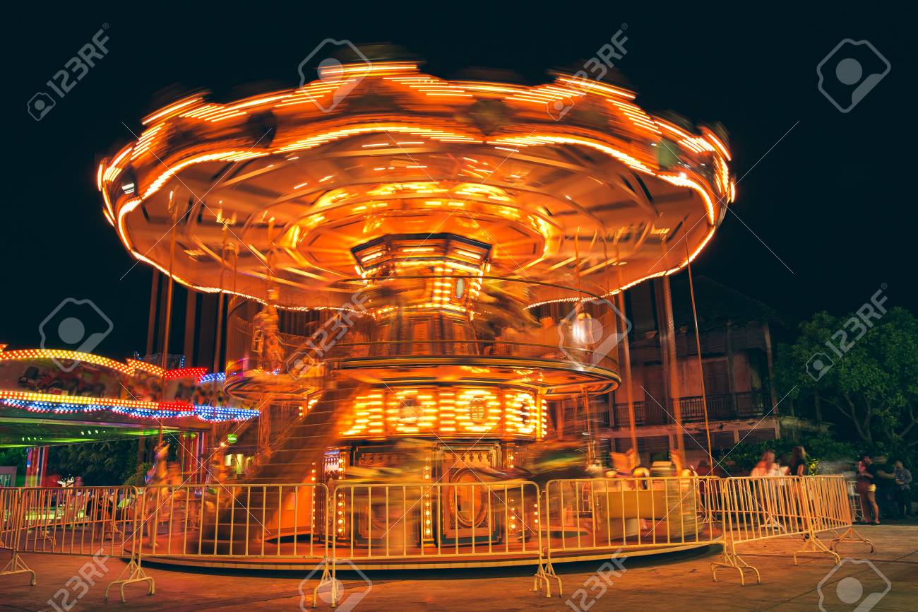 selective focus to some part flying horse carousel carnival stock