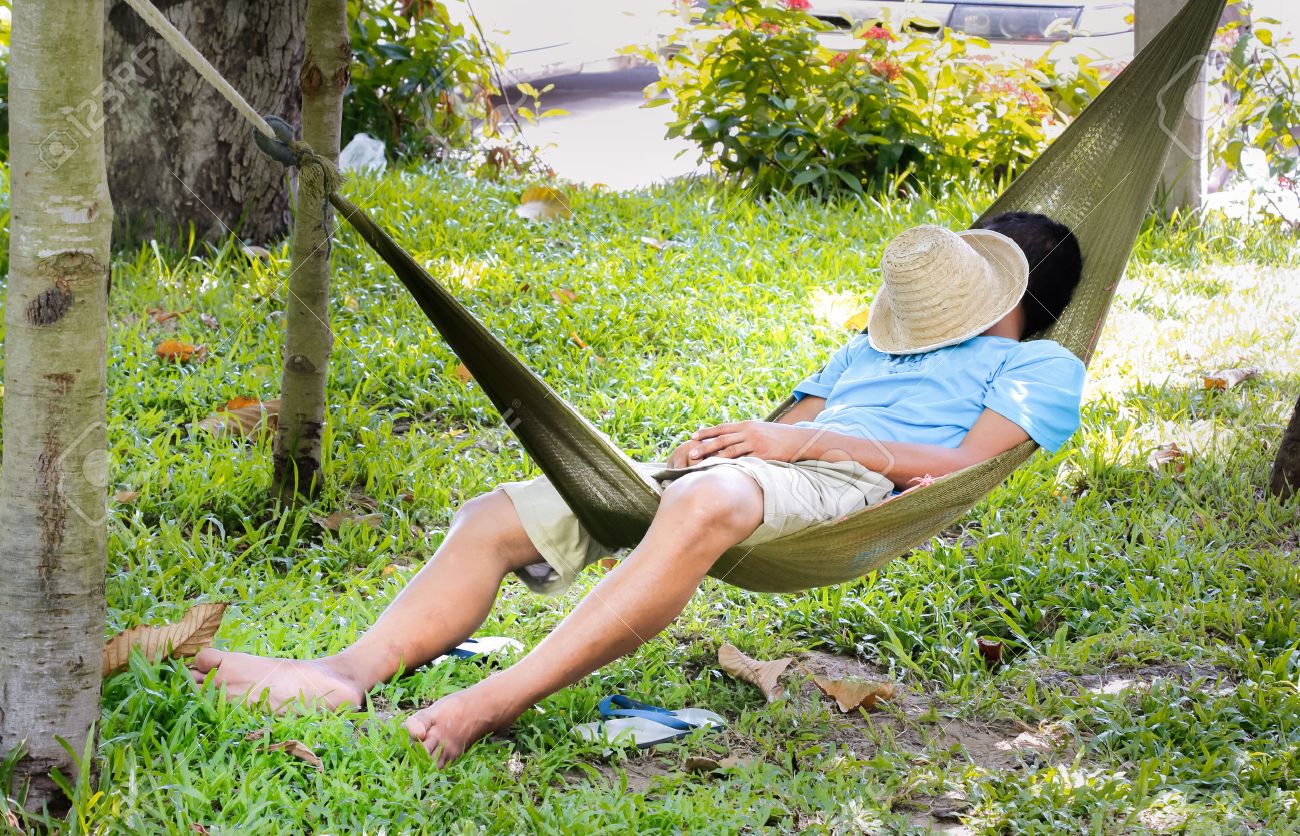 Man Sleep In A Hammock Stock Photo, Picture And Royalty Free Image ... Man Sleep In A Hammock Stock Photo, Picture And Royalty Free Image ...