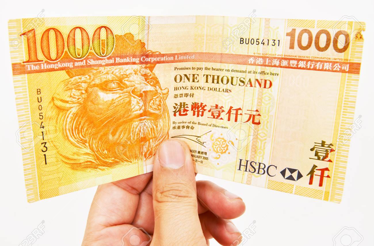 1 천 홍콩 달러의 손 로열티 무료 사진, 그림, 이미지 그리고 스톡포토그래피. Image 41704524