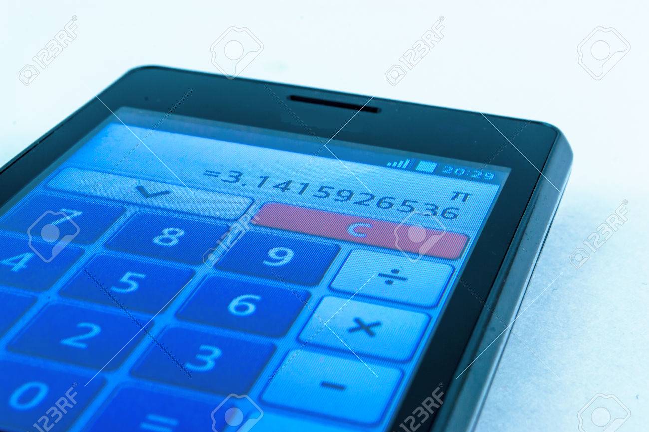 a mobile smart phone displays the symbol of pi 3 14 on its