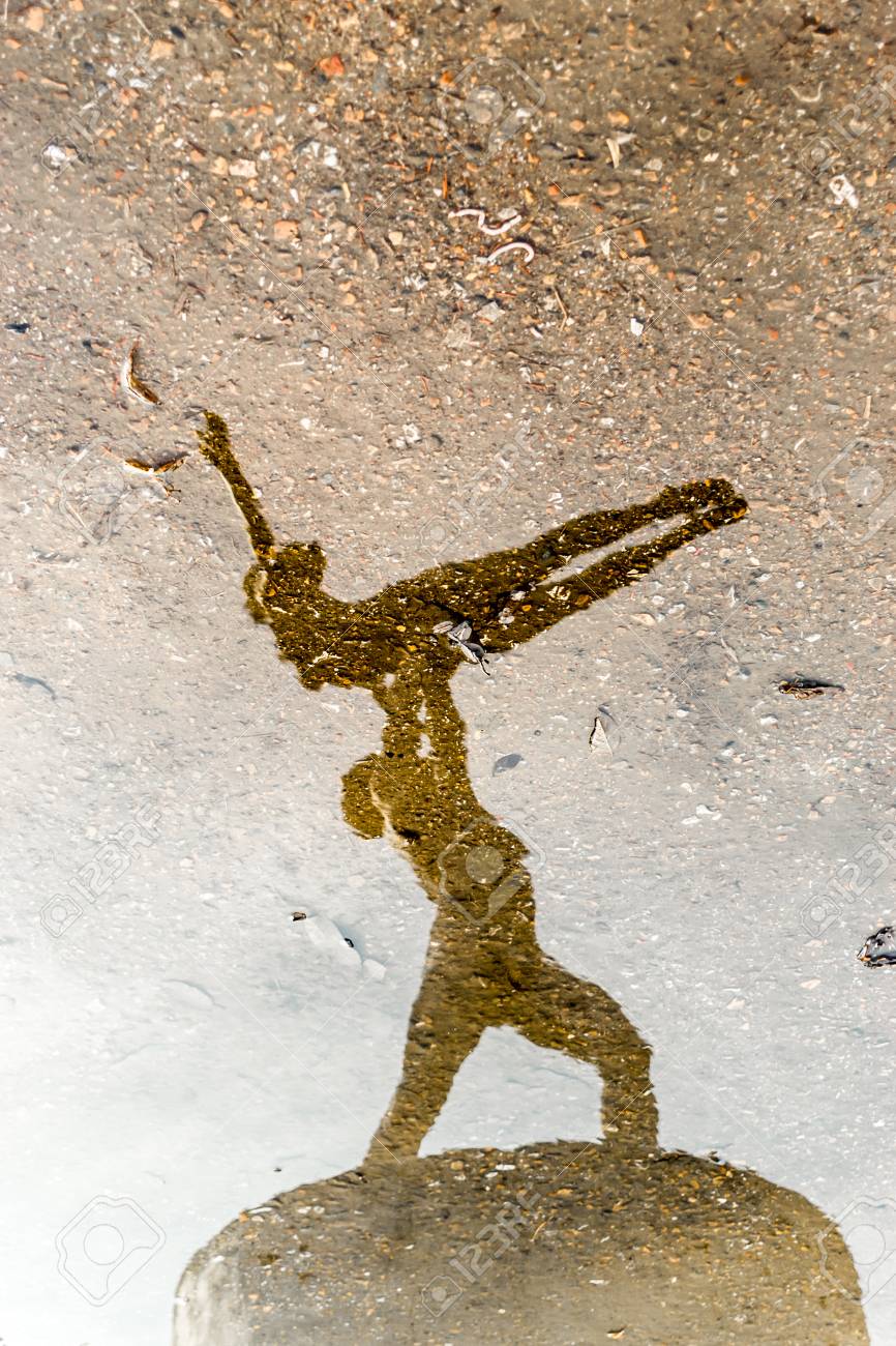 Man and Woman ballet dancers in stone reflected on water - 39543774 Man and Woman ballet dancers in stone reflected on water - 39543774