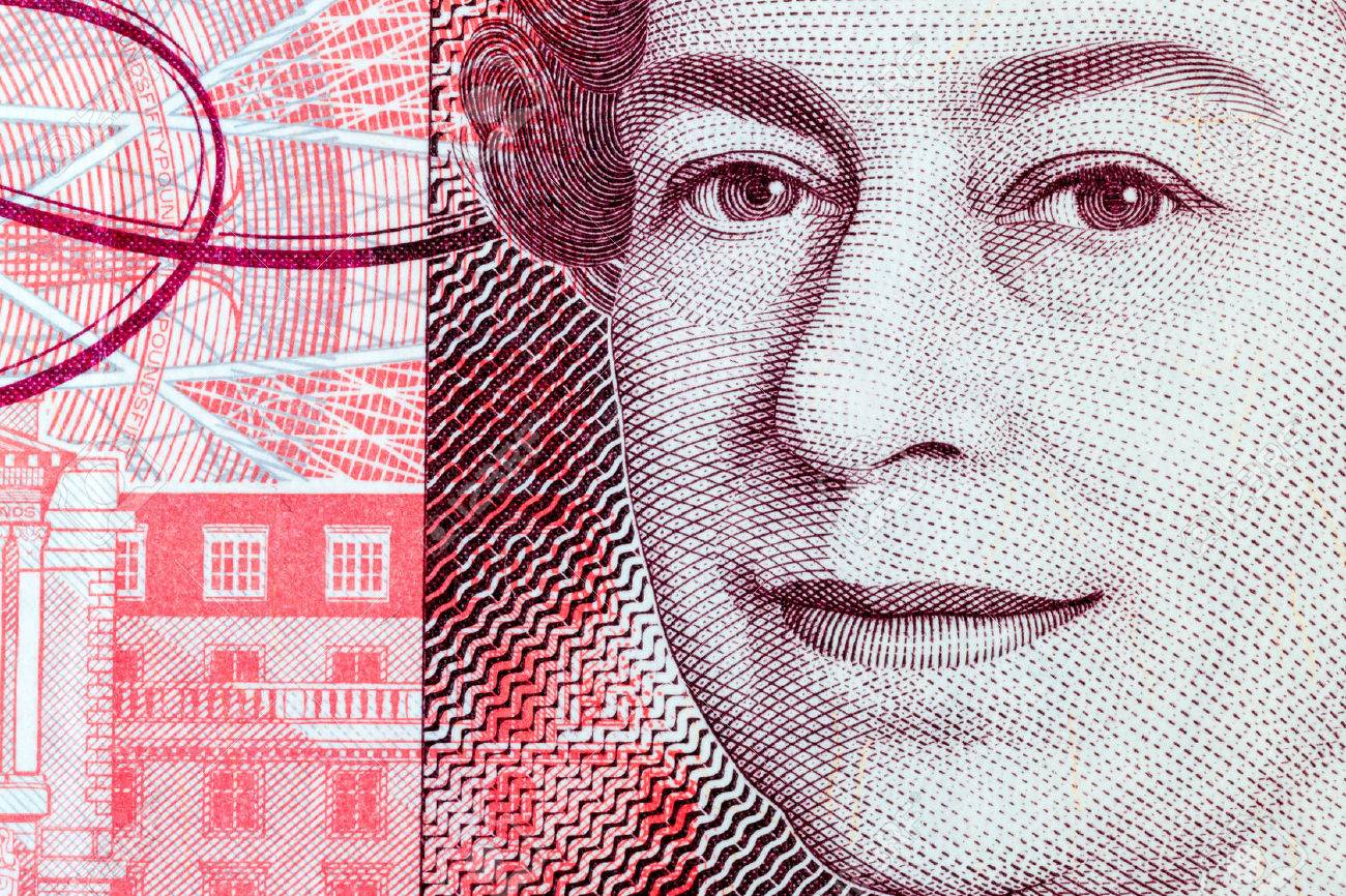 Macro close up studio shot of part of Queen Elizabeth the II head on the front of a British fifty pound note - 45132476 Macro close up studio shot of part of Queen Elizabeth the II head on the front of a British fifty pound note - 45132476