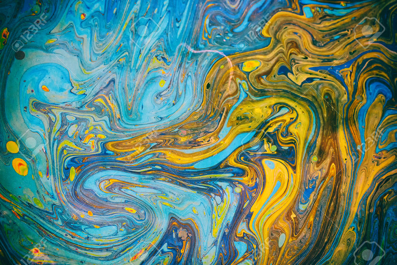 Toxic colours of oil and water in a chemical spill creating a psychedelic blur of rainbow colours. Copyspace area for environmental and pollution based themes and designs. - 155300727 Toxic colours of oil and water in a chemical spill creating a psychedelic blur of rainbow colours. Copyspace area for environmental and pollution based themes and designs. - 155300727