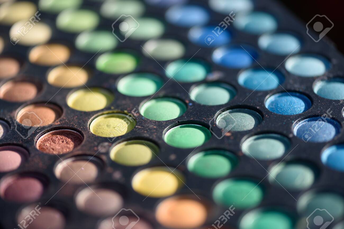 Closeup macro of paints used for makeup and face painting with different colours - 155300734 Closeup macro of paints used for makeup and face painting with different colours - 155300734