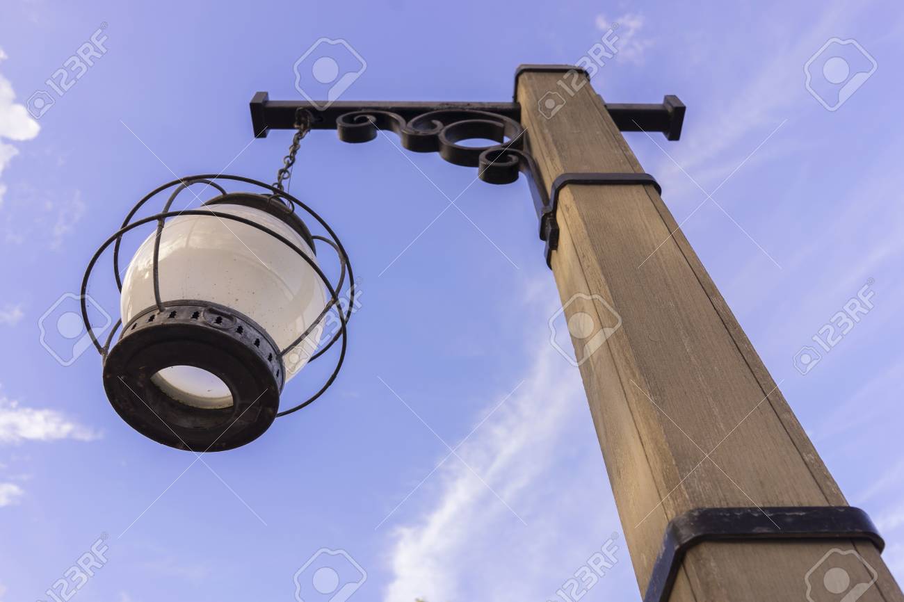 wooden light post vintage old west and rusty stock photo picture
