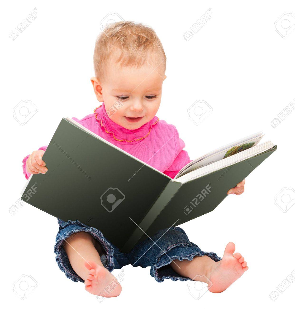 adorable one year old baby reading a book isolated on white stock