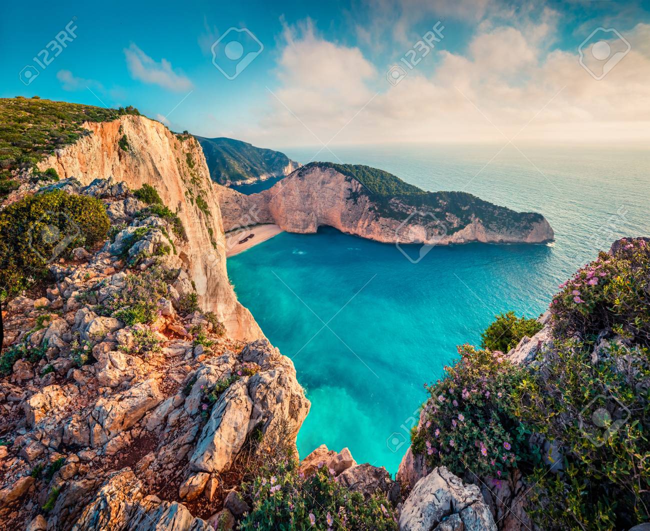 Colorful spring view of Navagio beach with shipwreck. Sunny morning seascape of Ionian Sea, Zakynthos (Zante) island, Greece, Europe. - 96466317 Colorful spring view of Navagio beach with shipwreck. Sunny morning seascape of Ionian Sea, Zakynthos (Zante) island, Greece, Europe. - 96466317