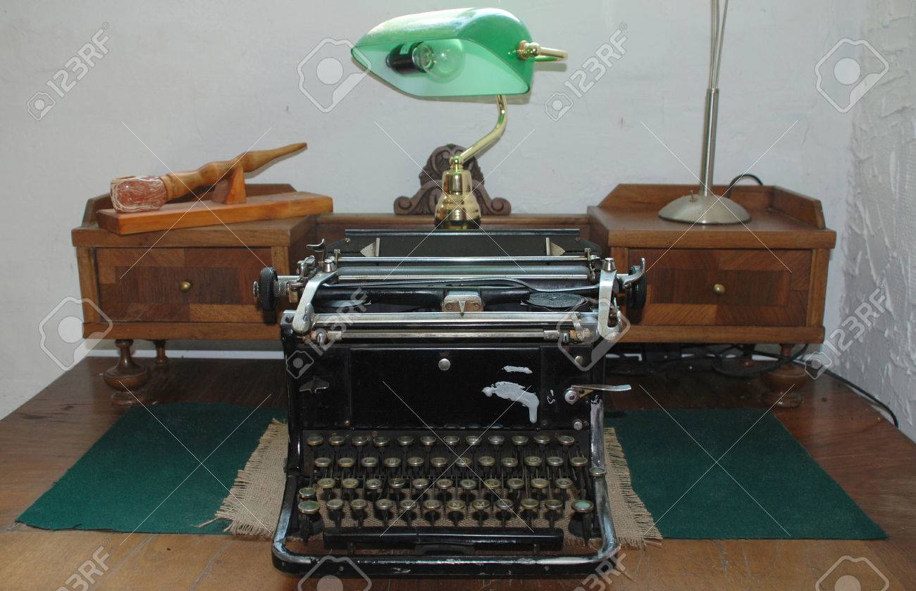 An Antique Manual Typewriter On A Antique Wooden Desk. Stock Photo An antique manual typewriter on a antique wooden desk. Stock Photo - 47714286 - An Antique Manual Typewriter On A Antique Wooden Desk. Stock Photo