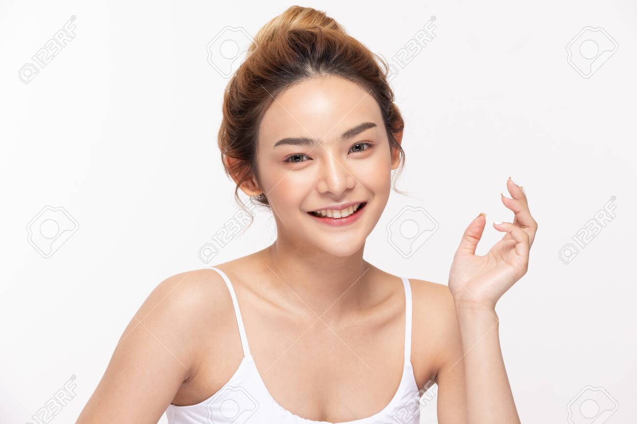 Beautiful Asian woman looking at camera smile with clean and fresh skin Happiness and cheerful with positive emotional,isolated on white background,Beauty and Cosmetics Concept - 156590496 Beautiful Asian woman looking at camera smile with clean and fresh skin Happiness and cheerful with positive emotional,isolated on white background,Beauty and Cosmetics Concept - 156590496