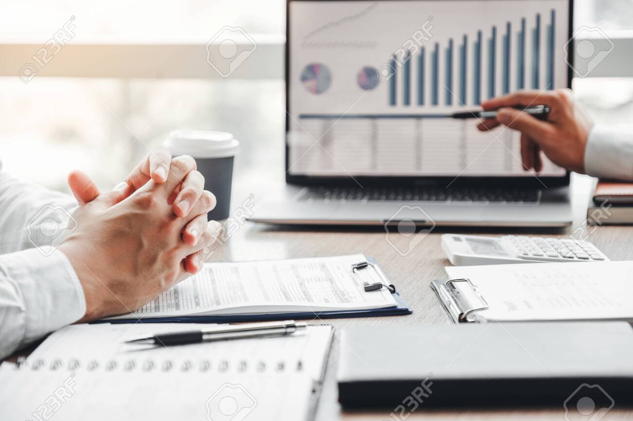 Business team meeting Strategy Planning with new startup project plan Finance and Economy Graph with laptop successful teamwork - 130738328 Business team meeting Strategy Planning with new startup project plan Finance and Economy Graph with laptop successful teamwork - 130738328