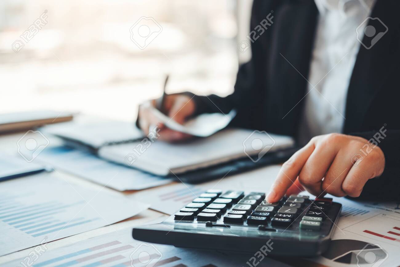Co-working Business Accounting investment and saving cost discussing new plan financial graph data - 132741007 Co-working Business Accounting investment and saving cost discussing new plan financial graph data - 132741007