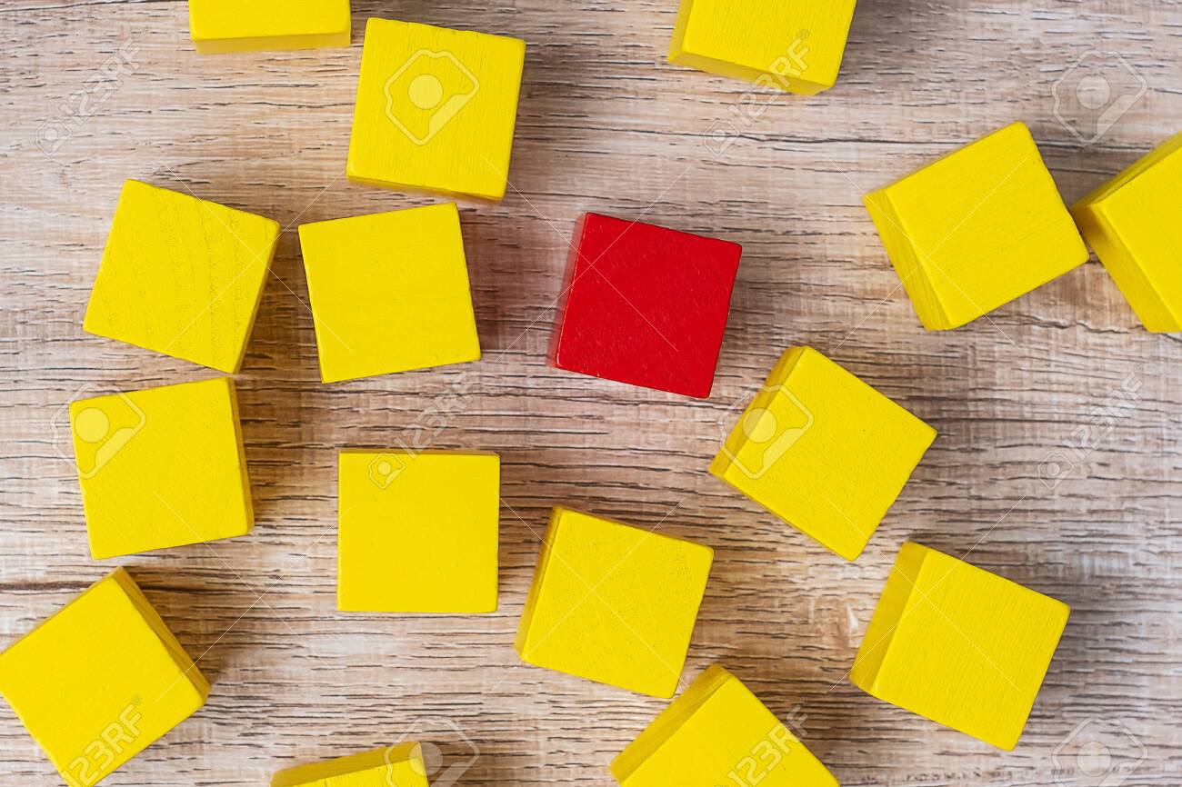 Red Cube Block Different From Crowd Of Yellow Blocks. Unique.. Stock Photo,  Picture And Royalty Free Image. Image 131072452.