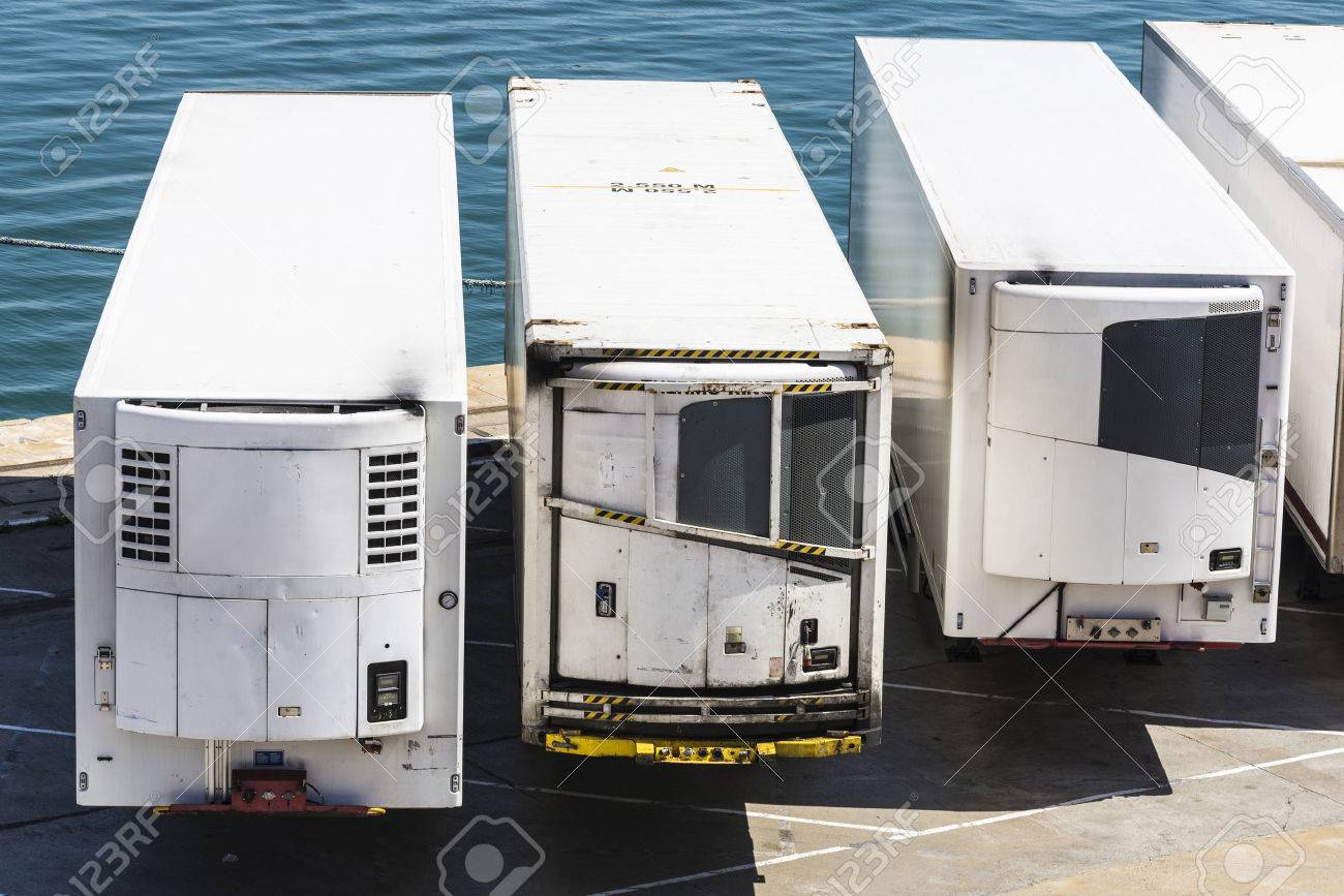 Reefer containers waiting to board at the port of Barcelona, Catalonia, Spain - 39570060 Reefer containers waiting to board at the port of Barcelona, Catalonia, Spain - 39570060