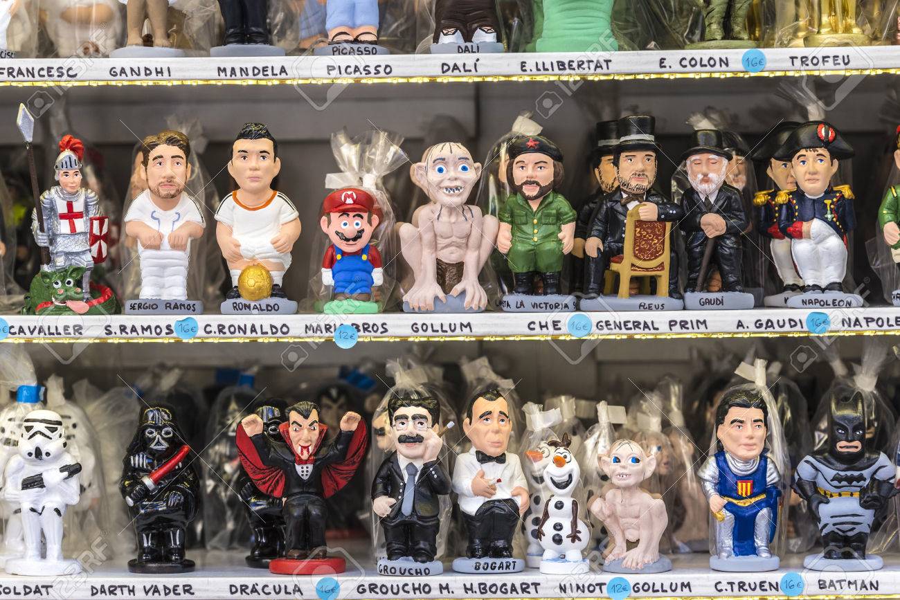 Barcelona, Spain - December 19, 2014: Santa Llucia Fair Is A Christmas  Market Items Where A Significant Figure Is The Caganer, Typical Figure  Catalan Manger. This Figure Represents Someone Defecating, Now You, image size:1300x867