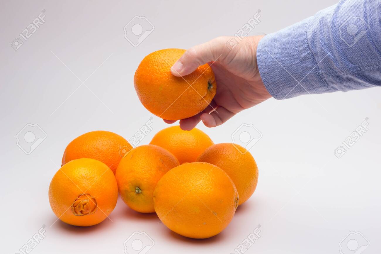 Orange Is A Fruit Of A Size That Fits In The Hand Of An Adult Stock Photo Picture And Royalty Free Image Image