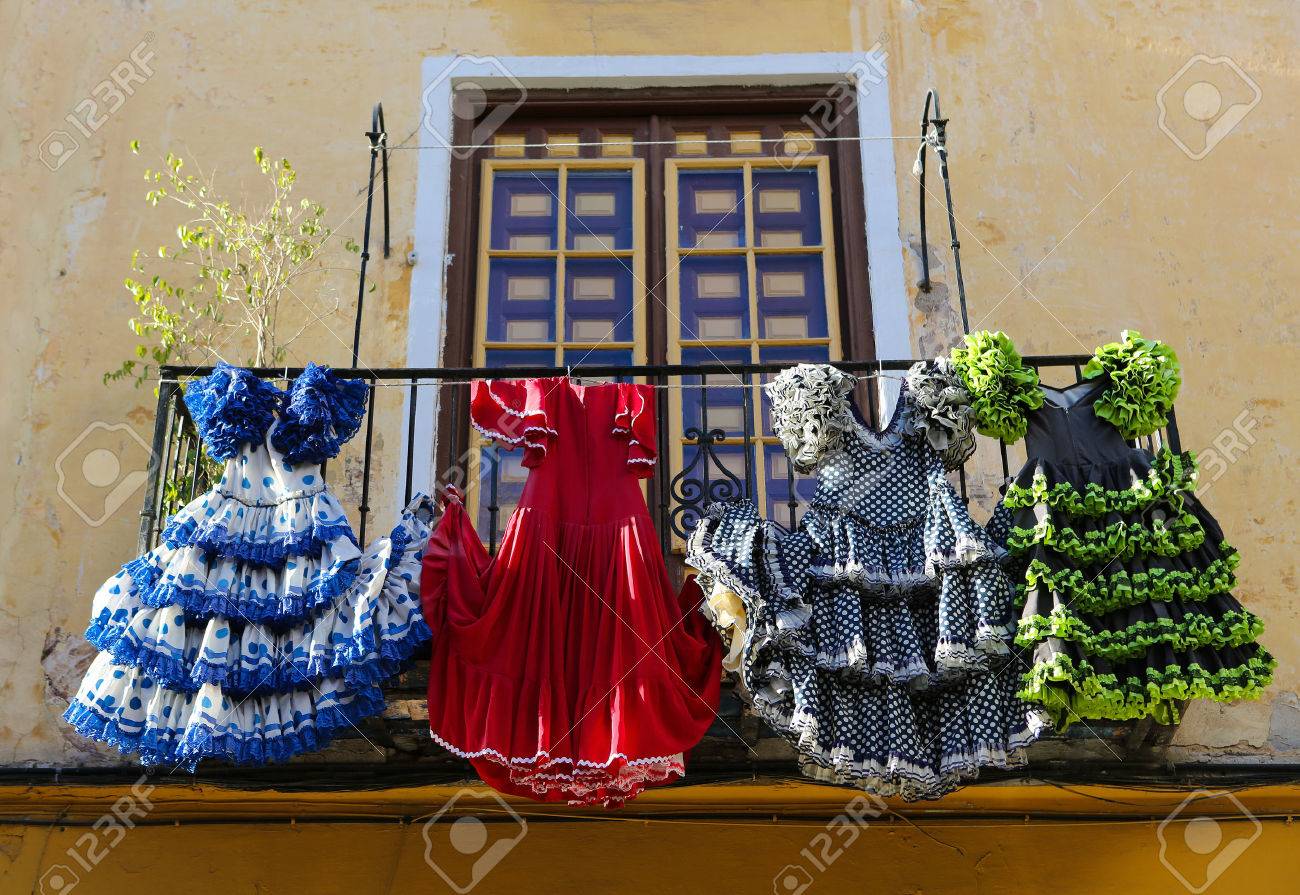 Traditional flamenco dresses at a house in Malaga, Andalusia, Spain. - 35780621 Traditional flamenco dresses at a house in Malaga, Andalusia, Spain. - 35780621