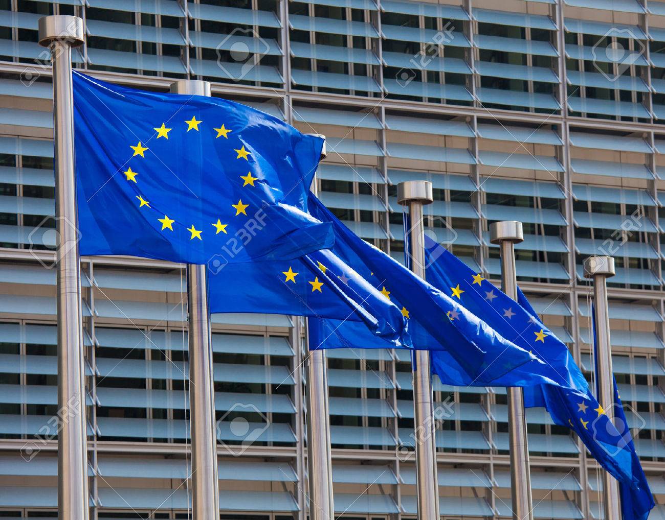 European flags in front of the Berlaymont building, headquarters of the European commission in Brussels. - 37205611 European flags in front of the Berlaymont building, headquarters of the European commission in Brussels. - 37205611