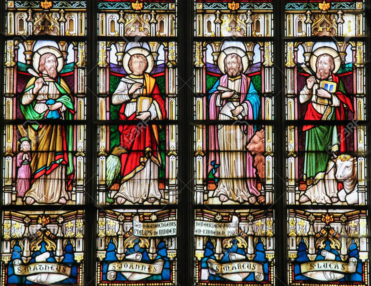 STABROEK, BELGIUM - JUNE 27, 2015: Stained glass window depicting the Four Evangelists, Saint Matthew, Saint John, Saint Mark and Saint Luke, in the Church of Stabroek, Belgium. - 42130560 STABROEK, BELGIUM - JUNE 27, 2015: Stained glass window depicting the Four Evangelists, Saint Matthew, Saint John, Saint Mark and Saint Luke, in the Church of Stabroek, Belgium. - 42130560