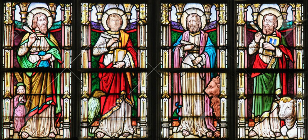 STABROEK, BELGIUM - JUNE 27, 2015: Stained glass window depicting the Four Evangelists, Saint Matthew, Saint John, Saint Mark and Saint Luke, in the Church of Stabroek, Belgium. - 42130546 STABROEK, BELGIUM - JUNE 27, 2015: Stained glass window depicting the Four Evangelists, Saint Matthew, Saint John, Saint Mark and Saint Luke, in the Church of Stabroek, Belgium. - 42130546