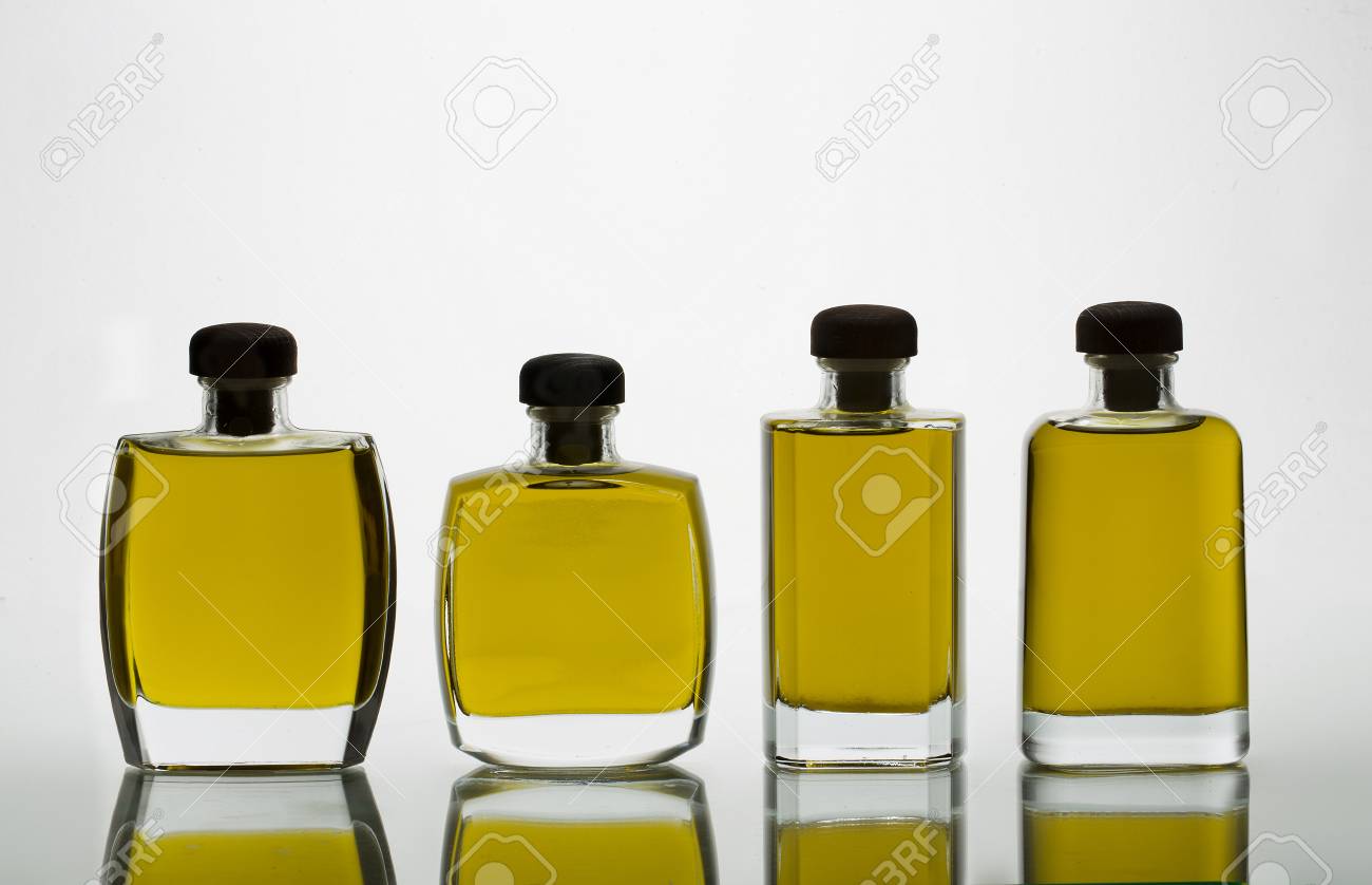 Download Glass Bottles With Extra Virgin Olive Oil And Intense Yellow Stock Photo Picture And Royalty Free Image Image 75724027 Yellowimages Mockups