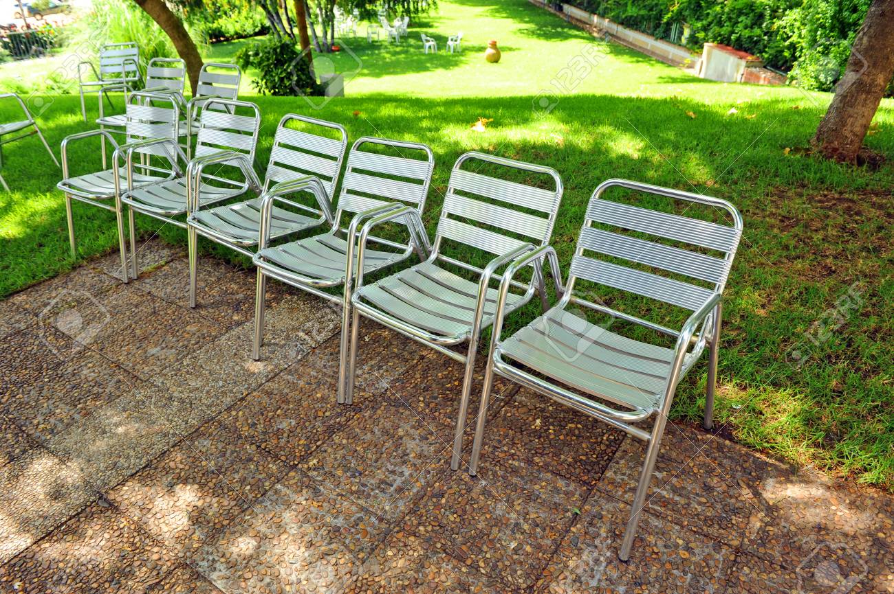 aluminum chairs on the terrace garden