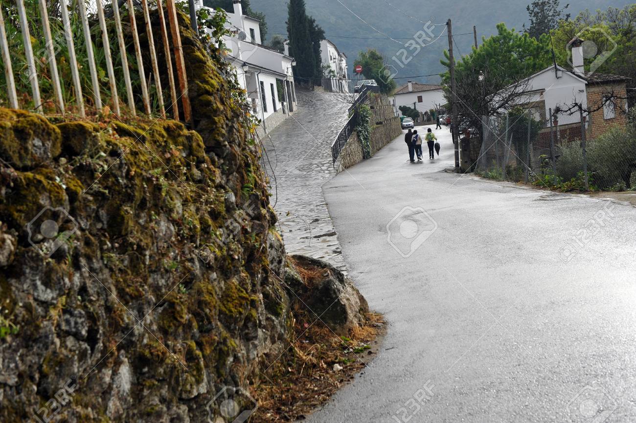 People Walking Alone The Road On The Outskirts Of Benamahoma