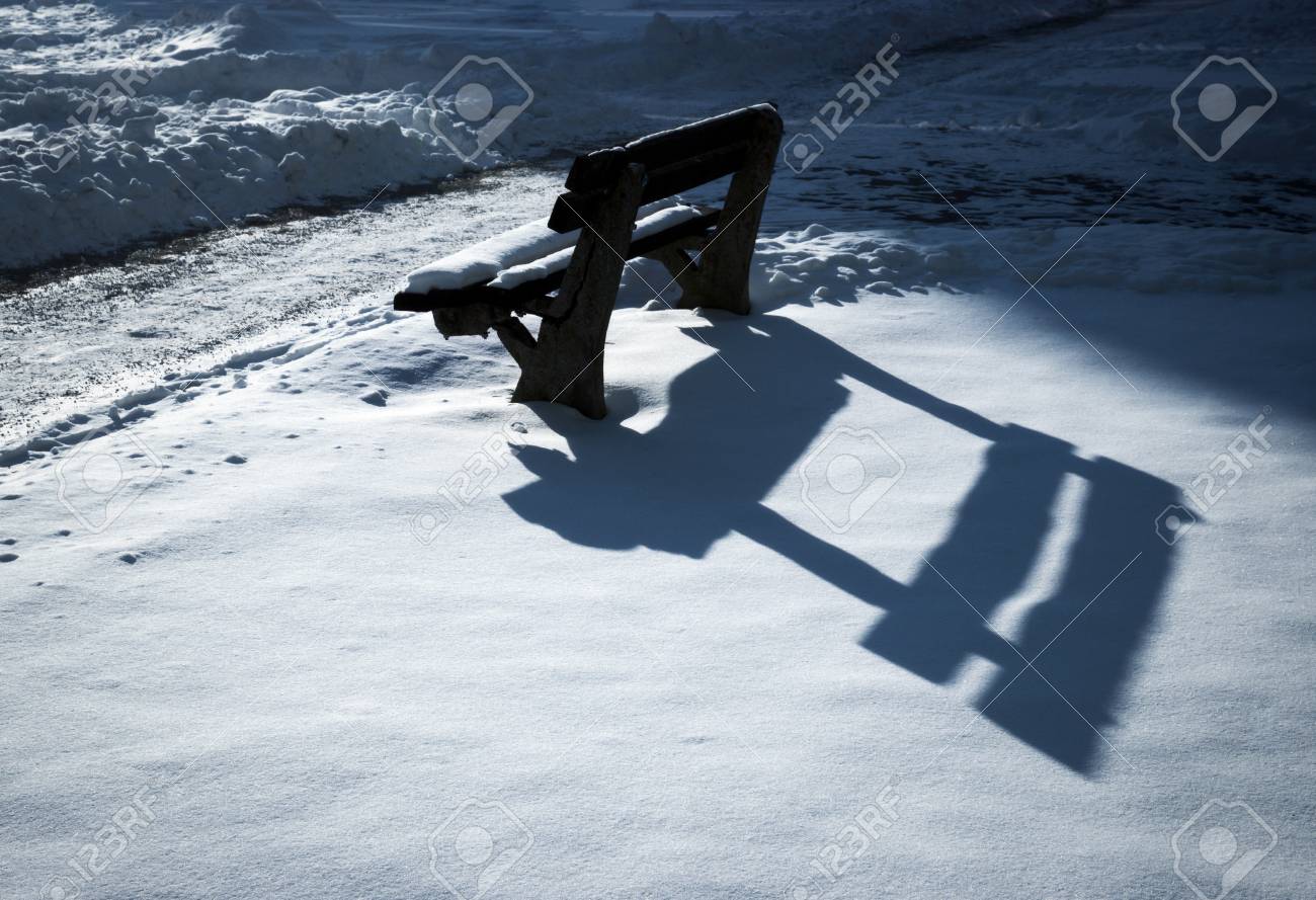 Seasonal Background Shadow On The Bench Early Evening Snow Stock Photo Picture And Royalty Free Image Image