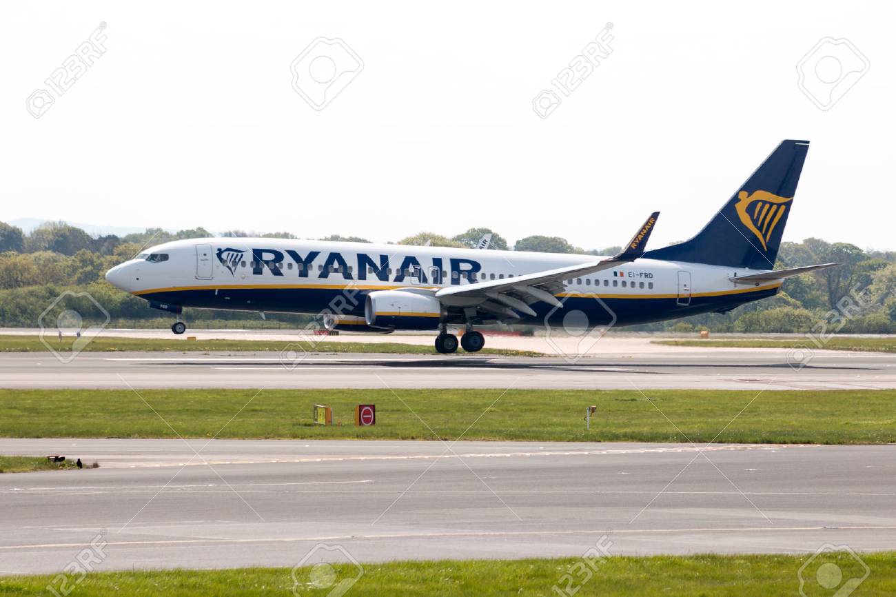 Ryanair Boeing 737-8AS narrow-body passenger plane (EI-FRD) landing to Manchester International Airport runway. - 64045156 Ryanair Boeing 737-8AS narrow-body passenger plane (EI-FRD) landing to Manchester International Airport runway. - 64045156