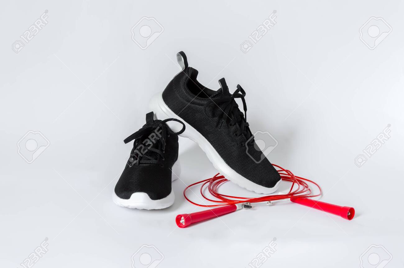 black running shoes with white soles