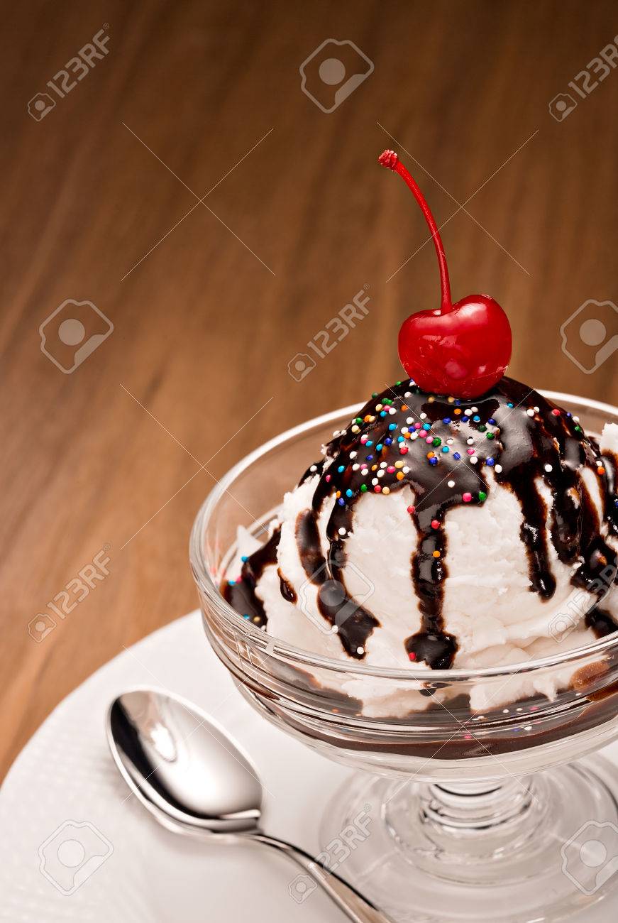 Ice Cream Sundae With Chocolate Sauce And A Cherry On Top Stock Photo,  Picture and Royalty Free Image. Image 46996172., image size:871x1300