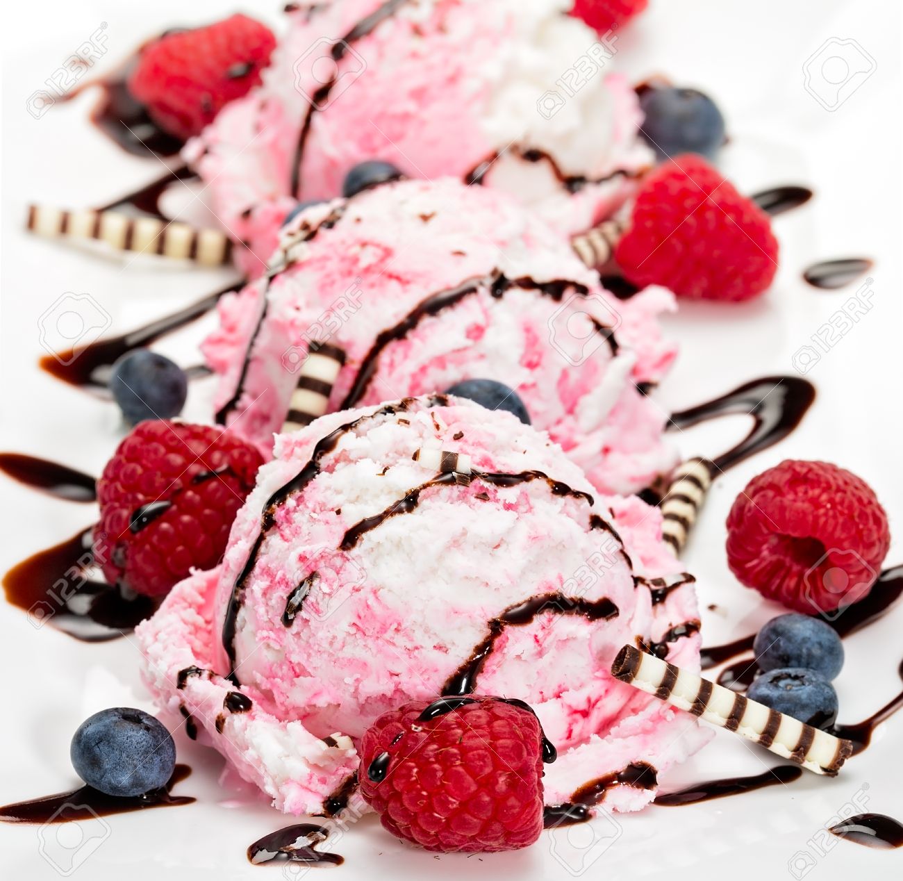 [Image: 48469588-fancy-icecream-dessert-with-thr...aspber.jpg]