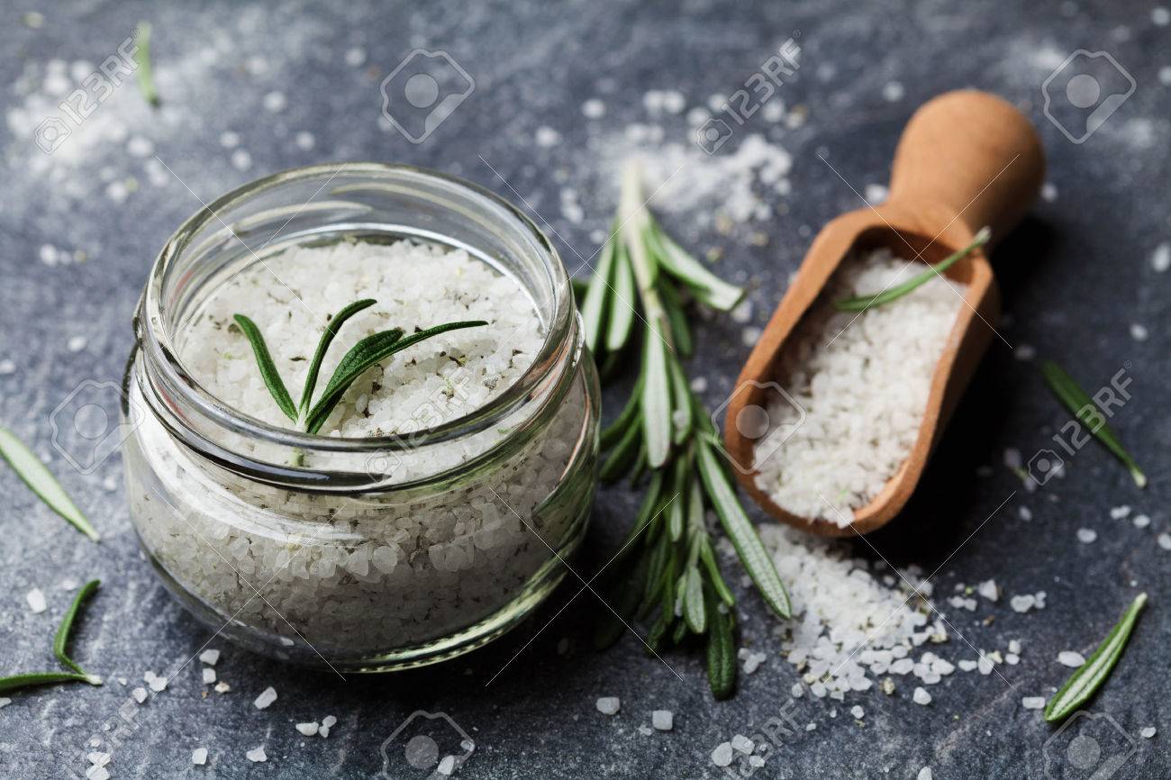 Sea salt scented herb rosemary on black stone background, vintage style - 50528724 Sea salt scented herb rosemary on black stone background, vintage style - 50528724