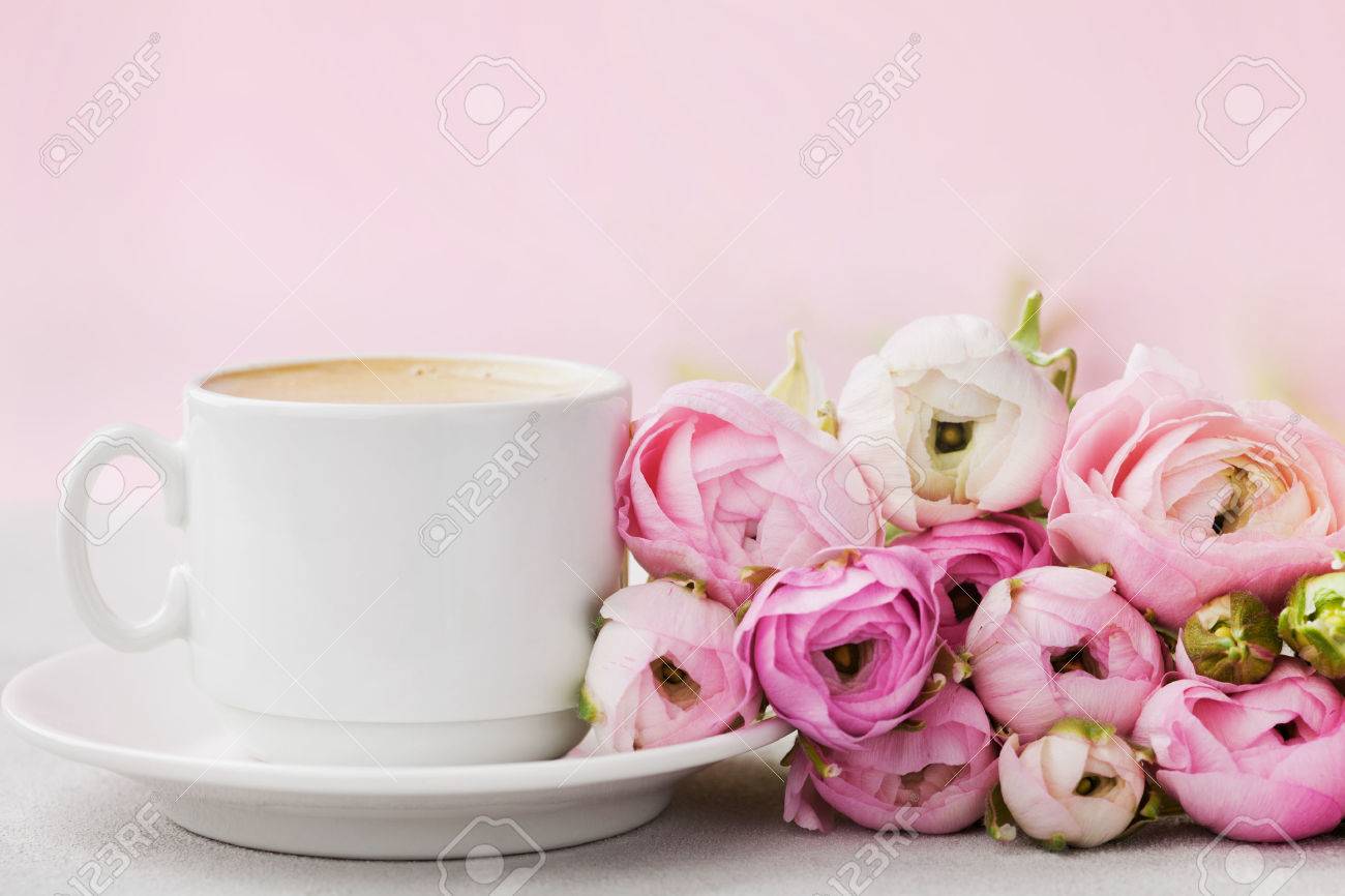 Beautiful spring Ranunculus flowers and cup of coffee on gray stone table. Pastel color. Greeting card for Valentines or Womans Day. Breakfast. Empty space for text. - 69005246 Beautiful spring Ranunculus flowers and cup of coffee on gray stone table. Pastel color. Greeting card for Valentines or Womans Day. Breakfast. Empty space for text. - 69005246