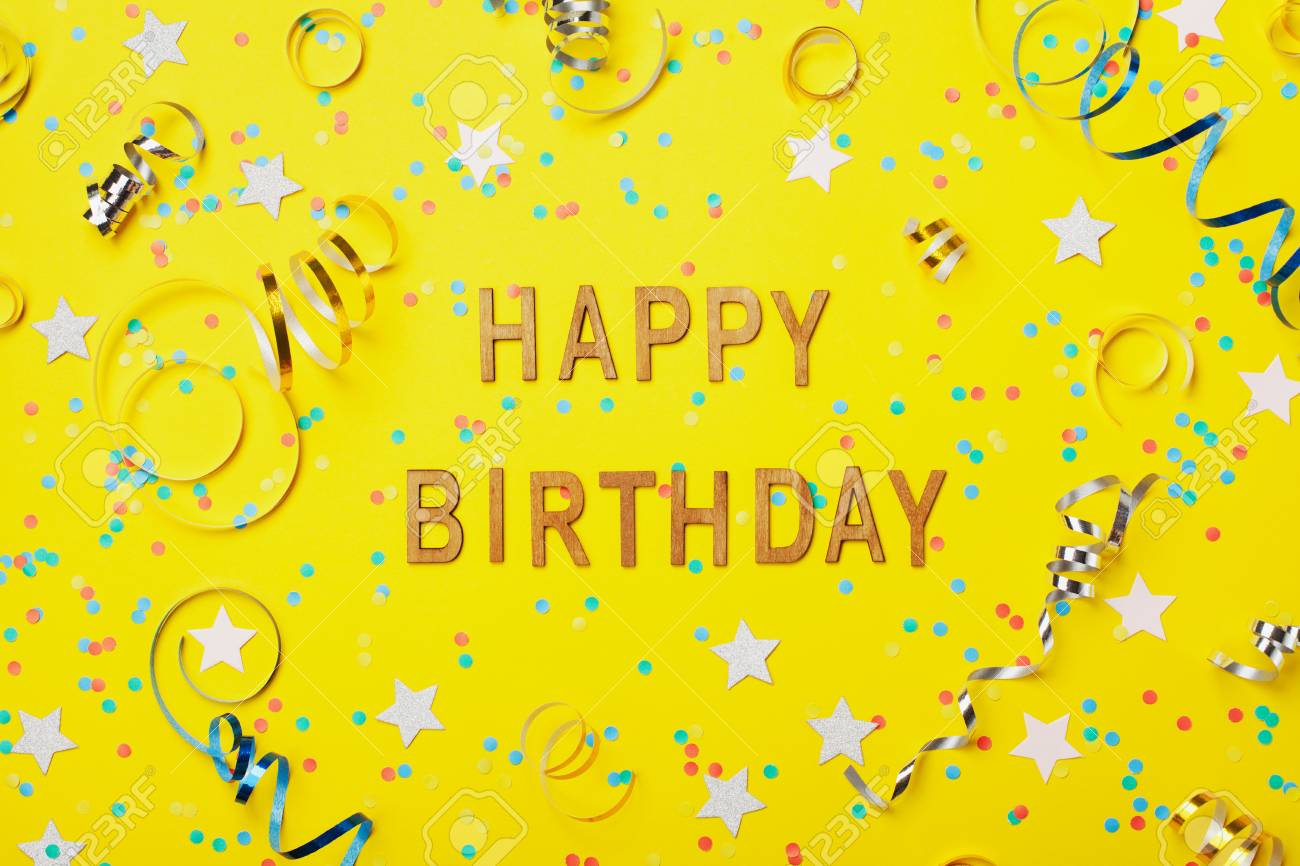 Happy Birthday Greeting Text Decorated With Confetti And Serpentine On Yellow  Background Top View. Flat Lay Style. Stock Photo, Picture And Royalty Free  Image. Image 83573849.