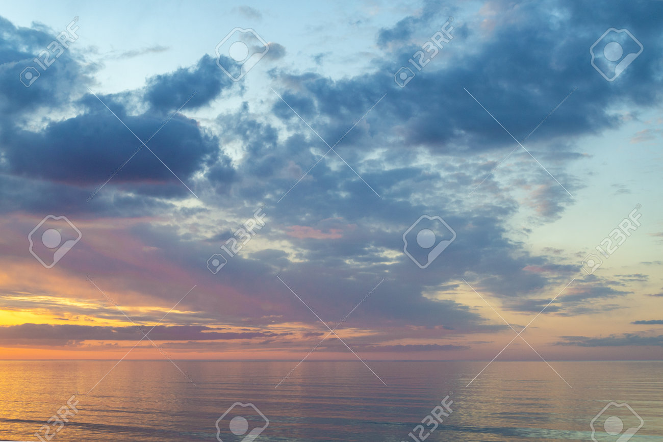 Summer mood. Beautiful colorful sunset over Baltic sea in Jurmala resort, Latvia. Warm evening on beach. Scenery view. - 168914541 Summer mood. Beautiful colorful sunset over Baltic sea in Jurmala resort, Latvia. Warm evening on beach. Scenery view. - 168914541