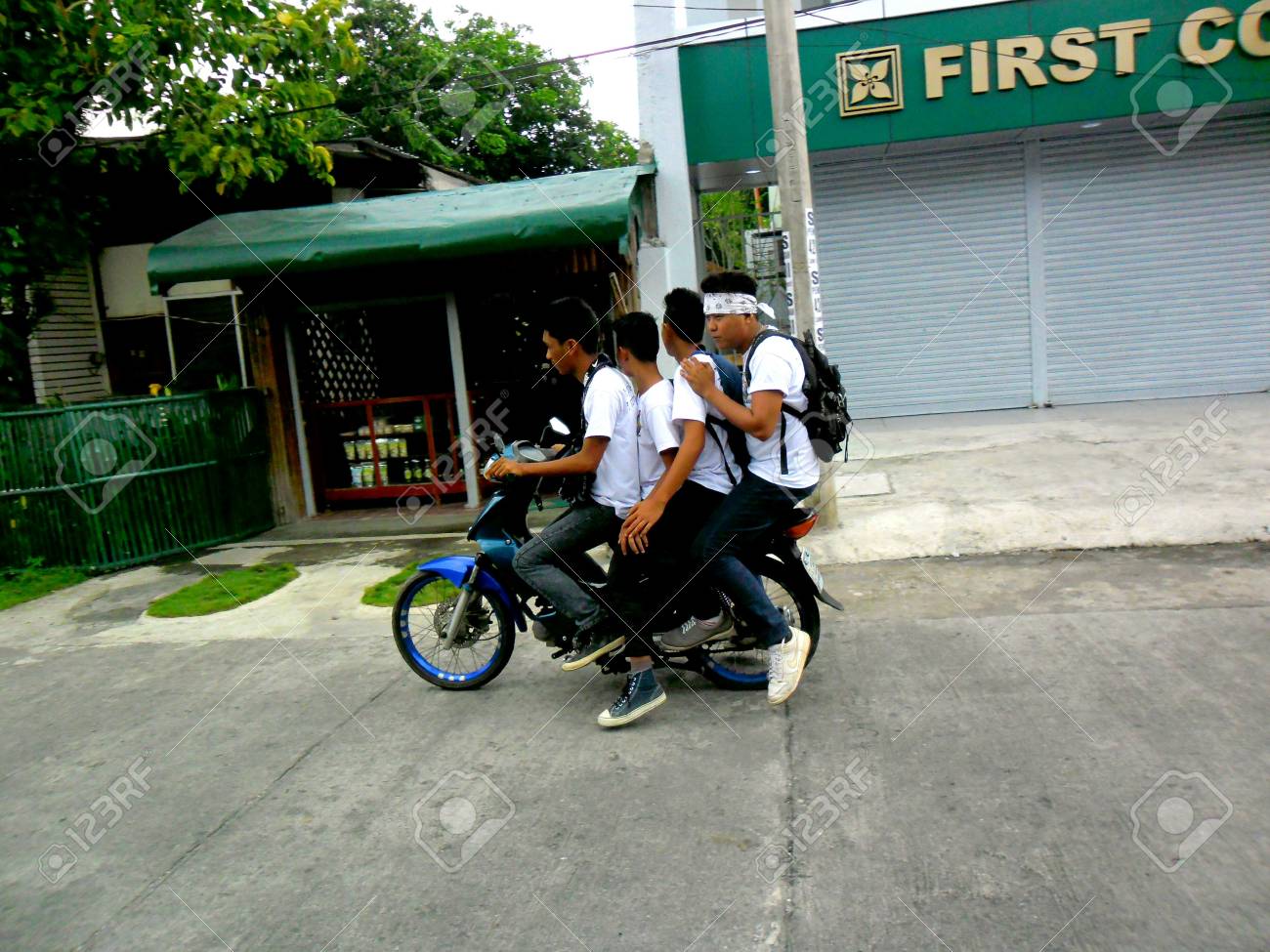 boys riding motorcycles