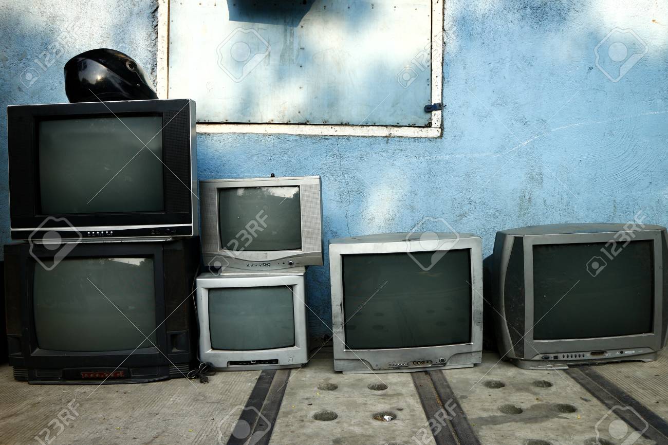 Photo of old and used television on display at a repair shop - 126677460 Photo of old and used television on display at a repair shop - 126677460