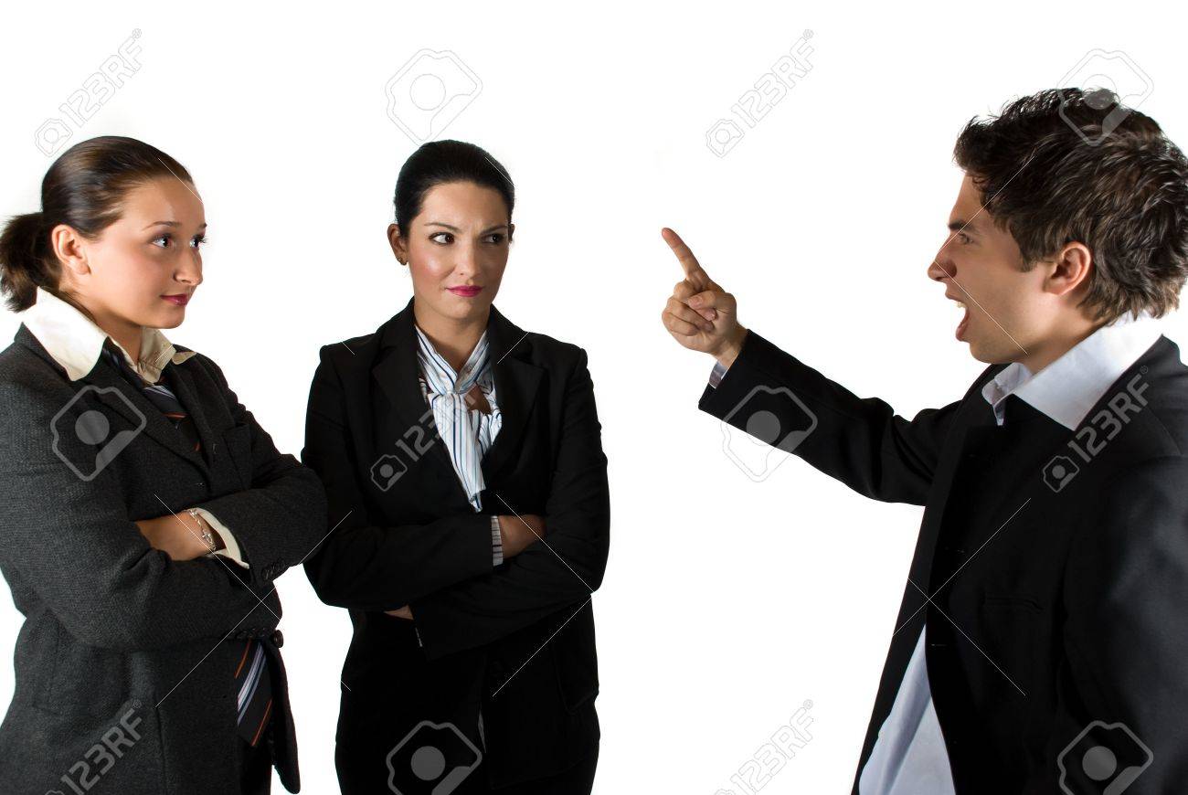 Angry boss businessman screaming and pointing to his colleagues businesswoman who listen him shocked - 4837513 Angry boss businessman screaming and pointing to his colleagues businesswoman who listen him shocked - 4837513