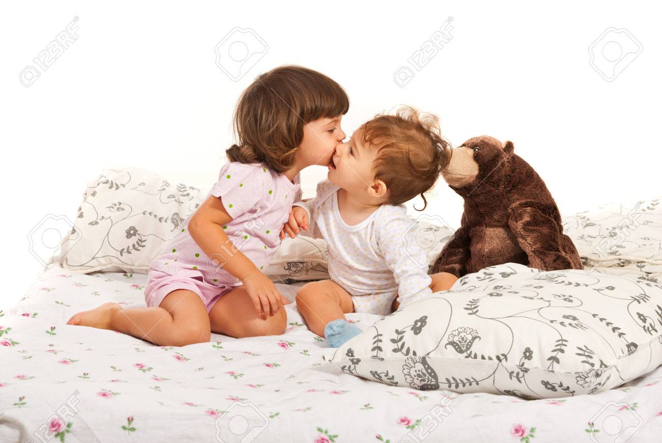 Girls Kissing On Beds