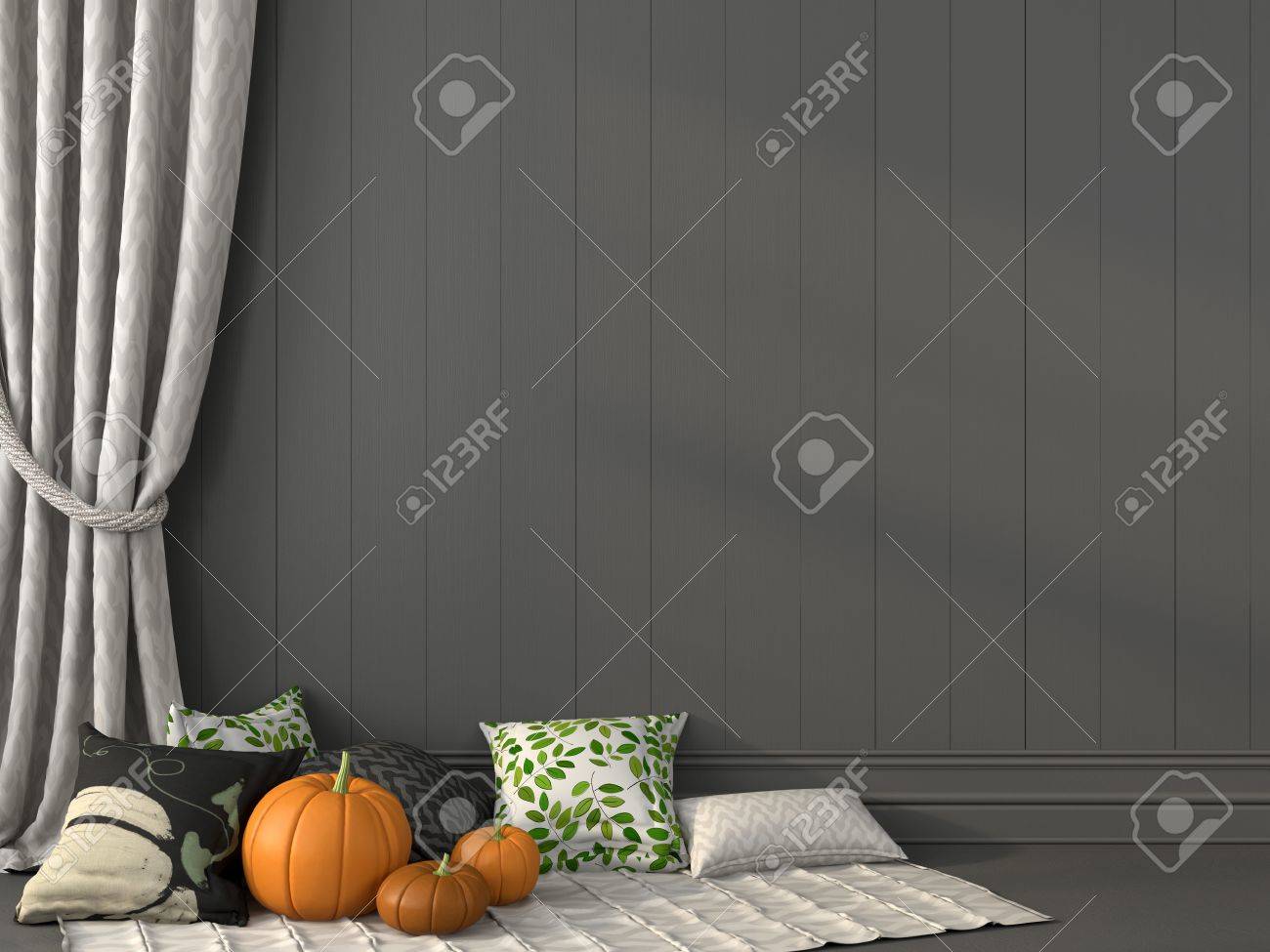 pillows with print topical for halloween against the backdrop of gray wall and curtain stock photo