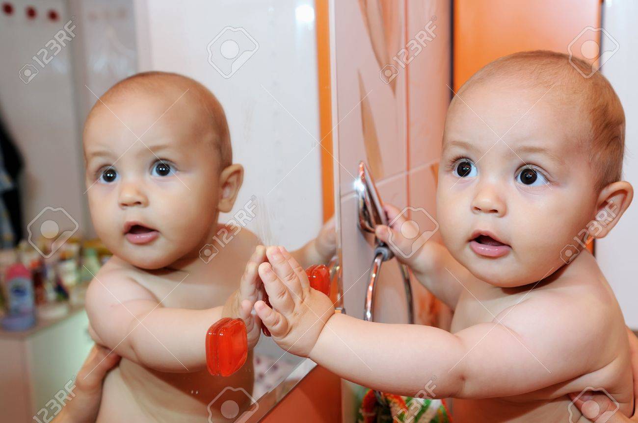 Why Babies Love Looking in Mirrors: A Parent's Insight, image size:1300x863