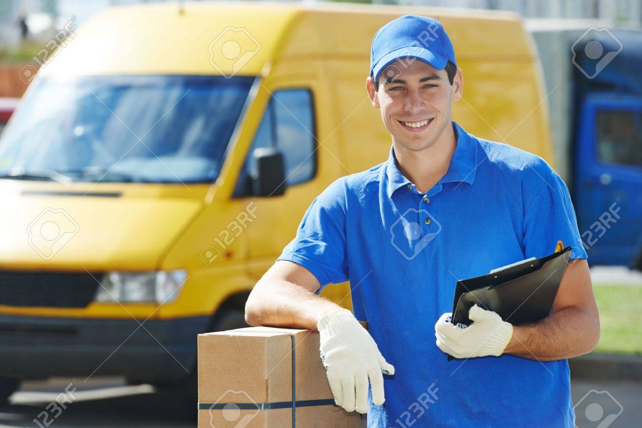 Smiling Young Male Postal Delivery Courier Man In Front Of Cargo Van Delivering Package Stock Photo Picture And Royalty Free Image Image 21945784