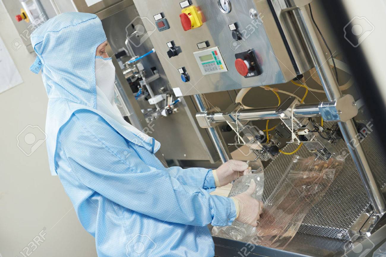 factory production operator pharmaceutical factory woman worker operating production line at pharmacy industry manufacture factory - Production Operator factory production operator pharmaceutical factory woman worker operating production line at pharmacy industry manufacture factory - Production Operator