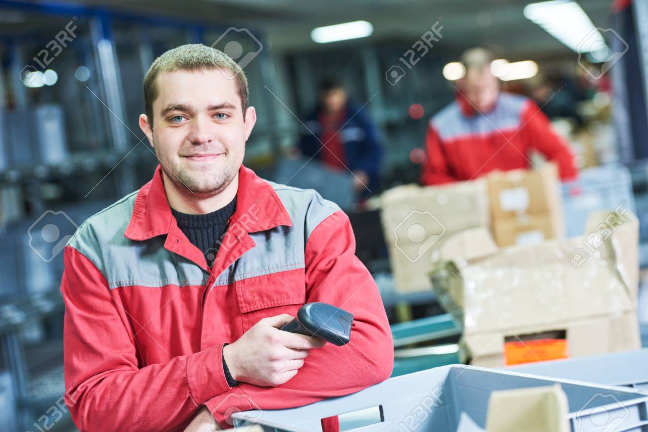 worker with barcode scanner at warehouse - 71388363 worker with barcode scanner at warehouse - 71388363