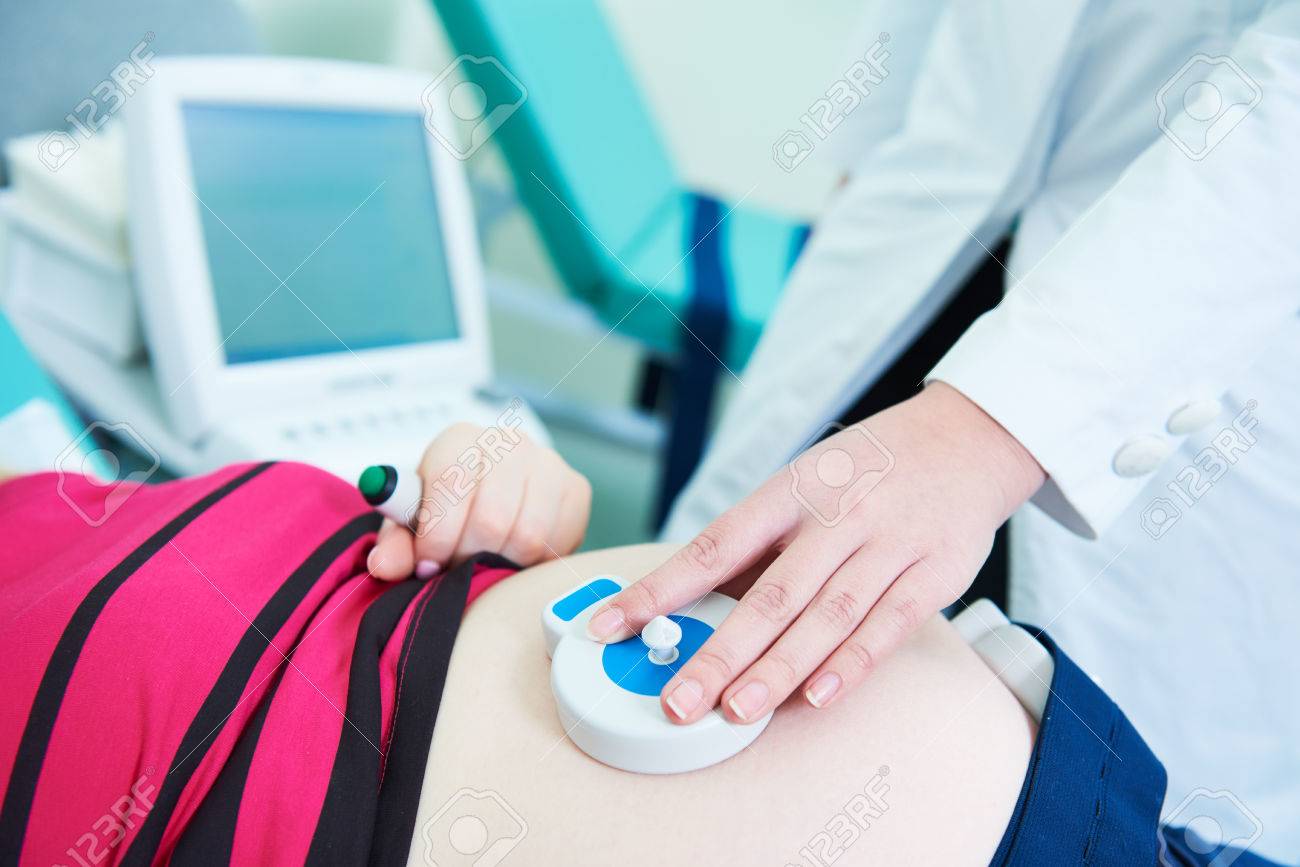 Pregnancy care. cardiotocography fetal heartbeat examination - 75091952 Pregnancy care. cardiotocography fetal heartbeat examination - 75091952